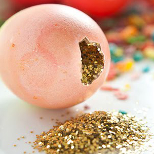 Pink Easter egg with gold confetti